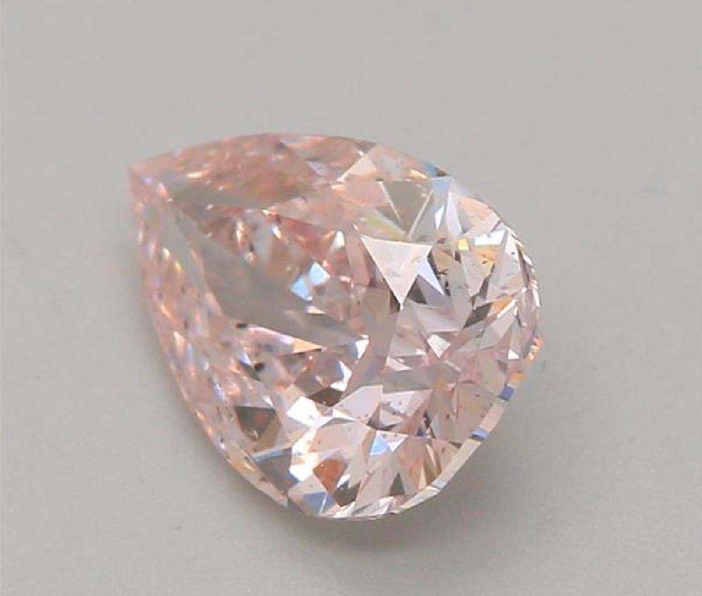 Pear Cut GIA Certified 0.77 Carat Light Pink Diamond For Sale