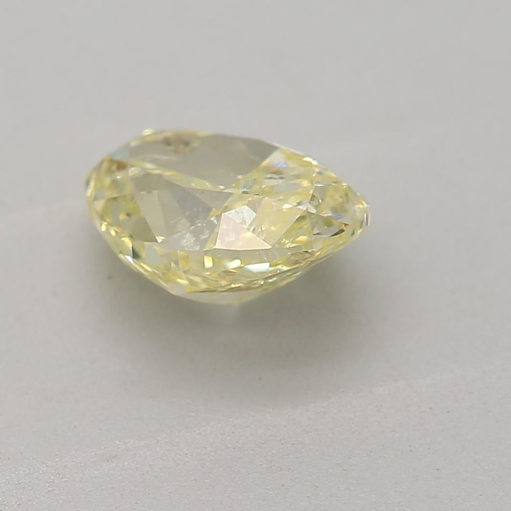 Women's or Men's GIA Certified 0.78 Carat Fancy Yellow I1 Clarity Diamond For Sale