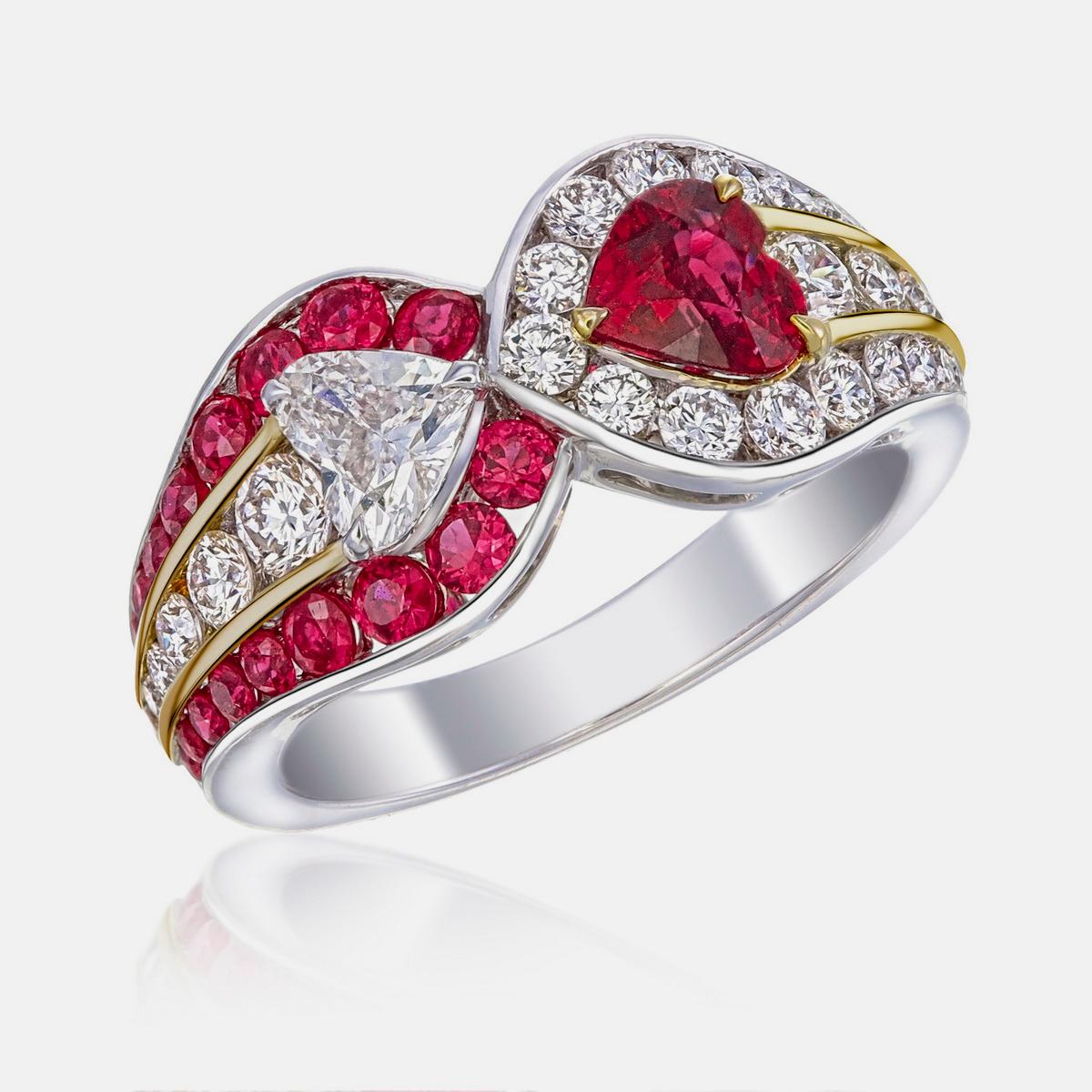 A brand new ring by REWA Jewelry which reimagines the timeless Toi et Moi style with a captivating pairing of a heart-shaped diamond and a rich ruby.

The centre of the ring is a heart shaped GIA (Gemological Institute of America) certified natural