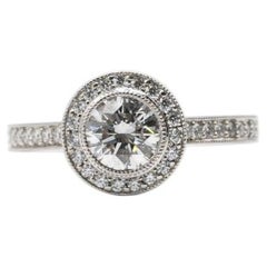 Anillo de compromiso de diamante brillante redondo natural certificado por GIA de 0.79 quilates