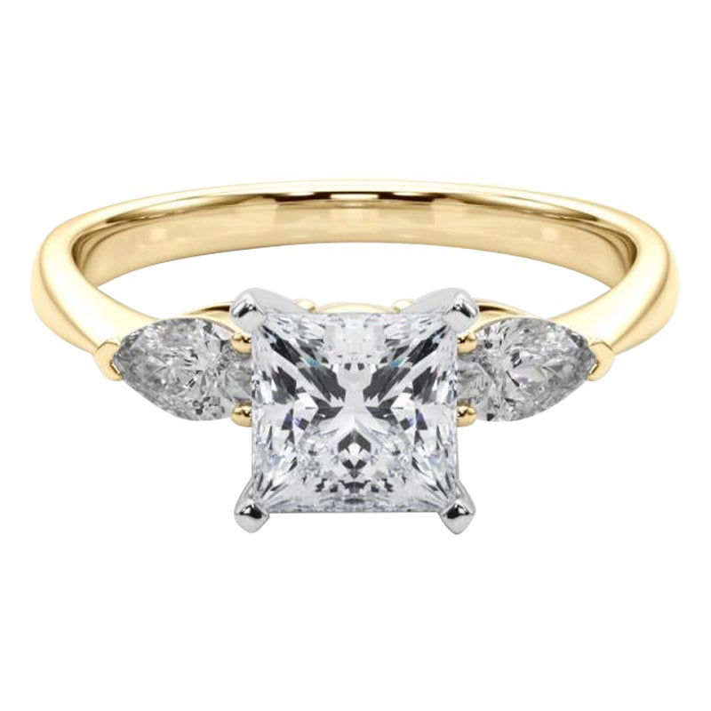 Anello con diamante a tre pietre Princess East-West certificato GIA da 0.8 carati