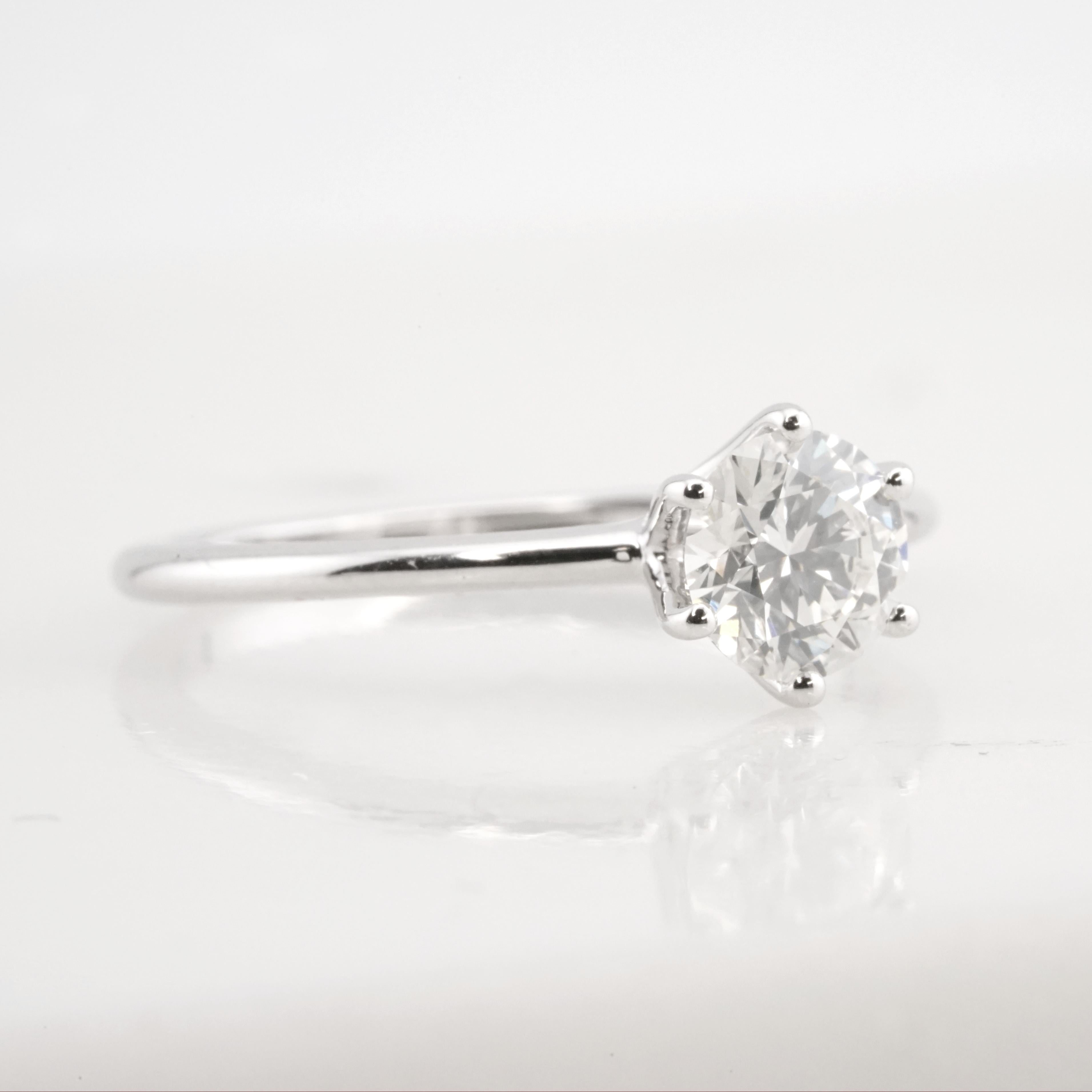 Discover the epitome of classic charm with the Antinori di Sanpietro Solitaire Engagement Ring.
 
Expertly fashioned in lustrous 18K white gold, this ring is crowned with a GIA Certified 0.80 carat Round Brilliant diamond that exudes an air of