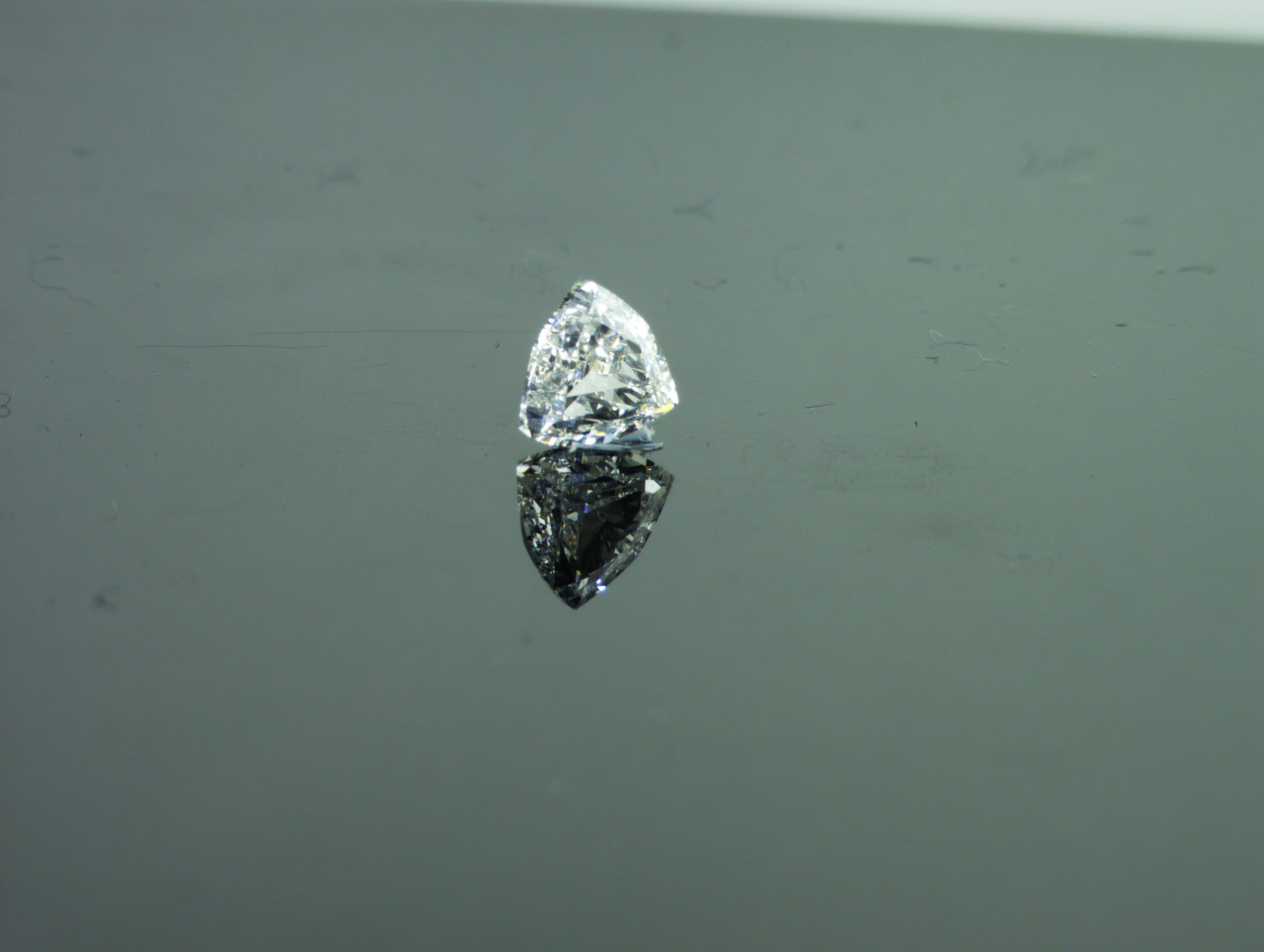 Modern GIA certified 0.80 carat Triangular Shape Natural Diamond  F VS1 For Sale