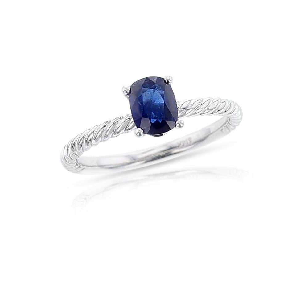 An Unheated Burma Sapphire Ring, weighing 0.80 carats, made in 14k White Gold. The GIA Report states that the stone is unheated and the origin is Burma. The Ring size is 6.75 US. The total weight of the ring is 2.61 grams. 