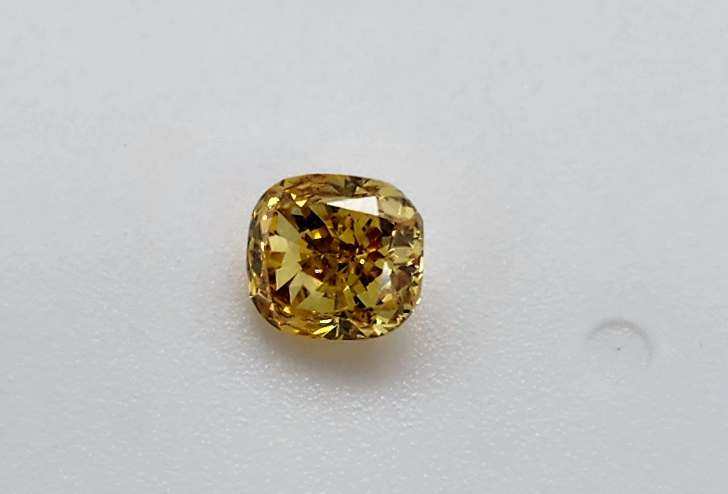 Loose Diamond GIA Certified
This is a Natural Diamond Cushion Modified Brilliant Cut
The diamond is 0.81 Carat SI1 Clarity
The color is Fancy Deep Orangy Yellow
The stone measures 5.34x4.89x3.45mm
The ring is for display purposes and not included