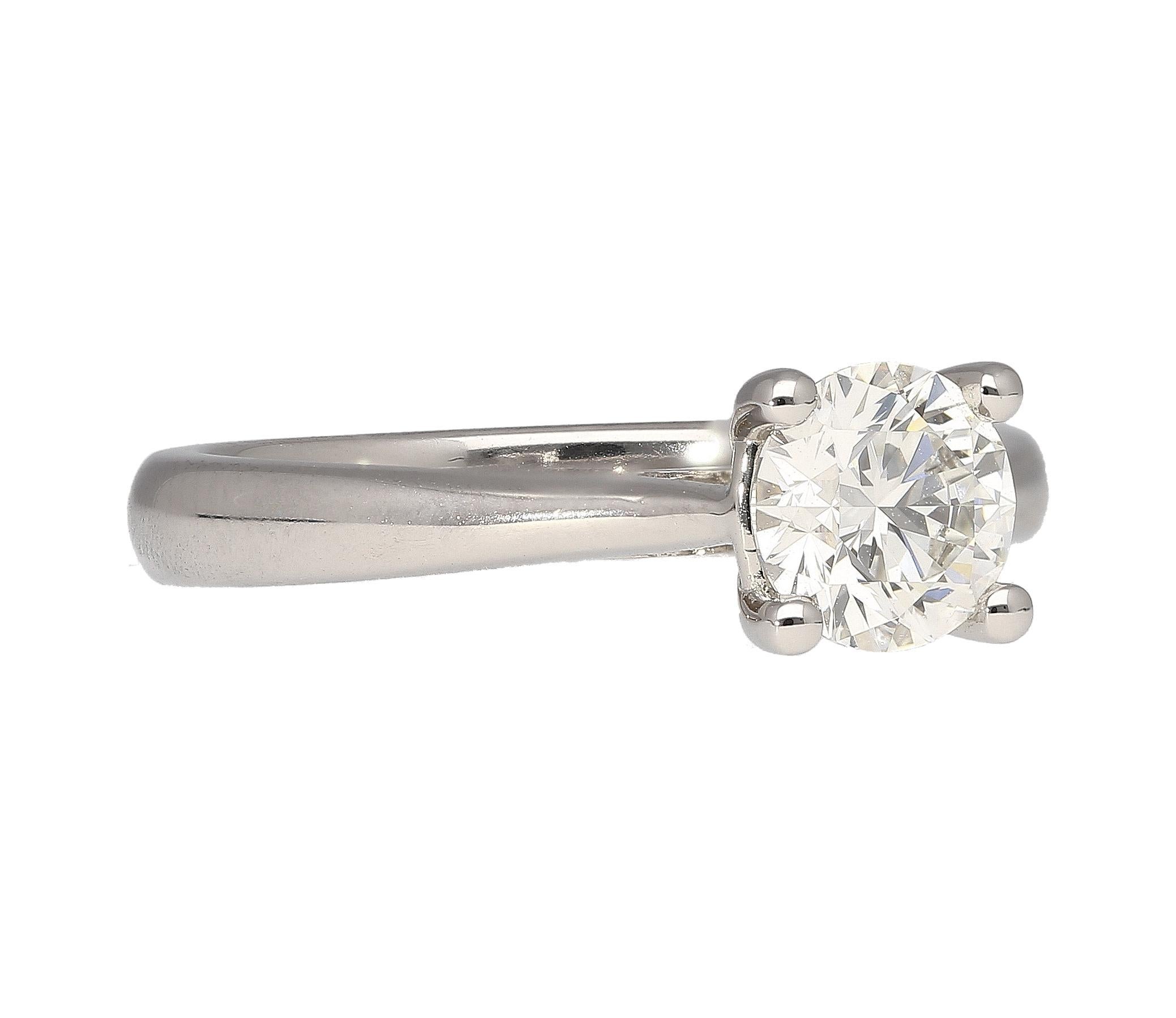 GIA Certified 0.81 carat natural diamond engagement ring. The diamond is secured in prong setting  on a cathedral shank. On the shank of the ring are 2 hidden round cut diamonds, one of each side to give an extra elegance to the ring. The main