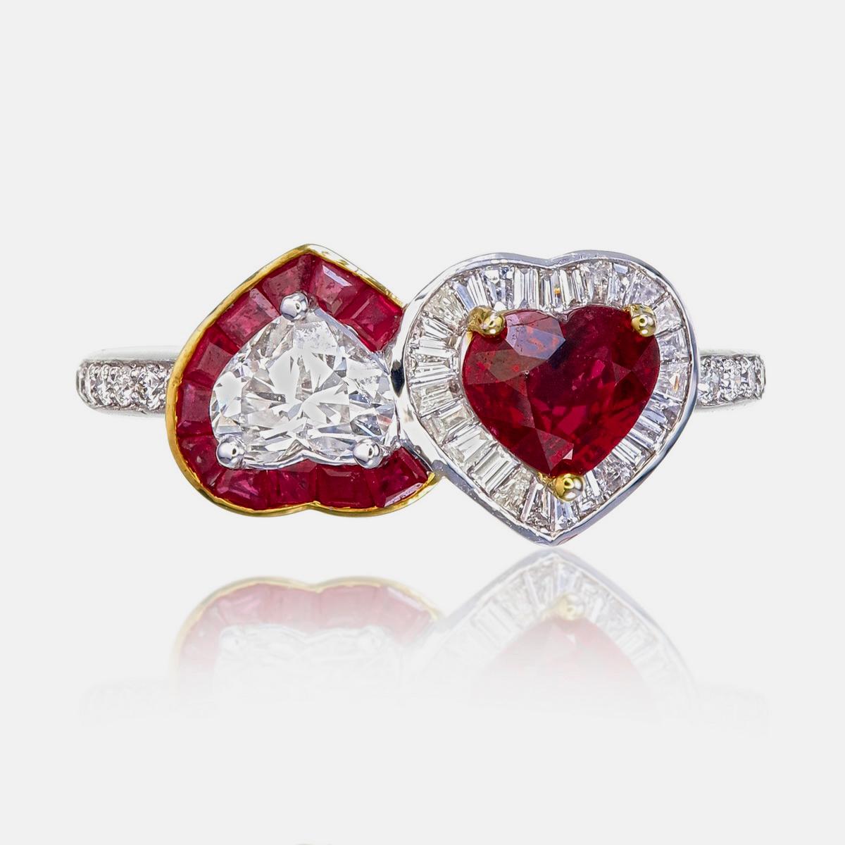 A brand new ring by REWA Jewelry which reimagines the timeless Toi et Moi style with a captivating pairing of a heart-shaped diamond and a rich ruby.

The centre of the ring is a heart shaped GIA (Gemological Institute of America) certified natural