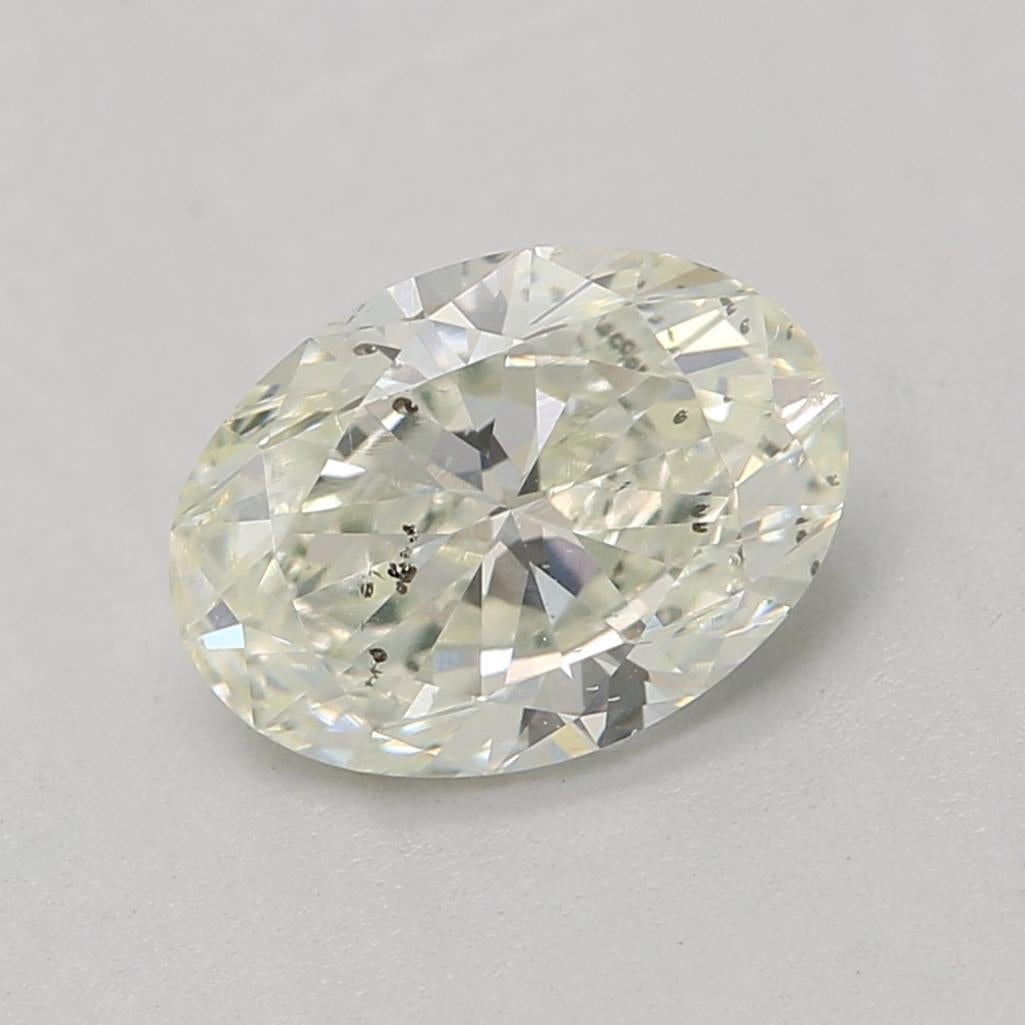 Certificate: GIA 
Report Number: 5463483008
Shape And Cut: Oval
Carat Weight: 0.81 carat
Measurements: 7.21 x 5.21 x 3.20 mm
Color Grade: Very Light Yellow Green 

FEATURES OF THE DIAMOND:

This Very Light Yellow Green diamond is a rare and