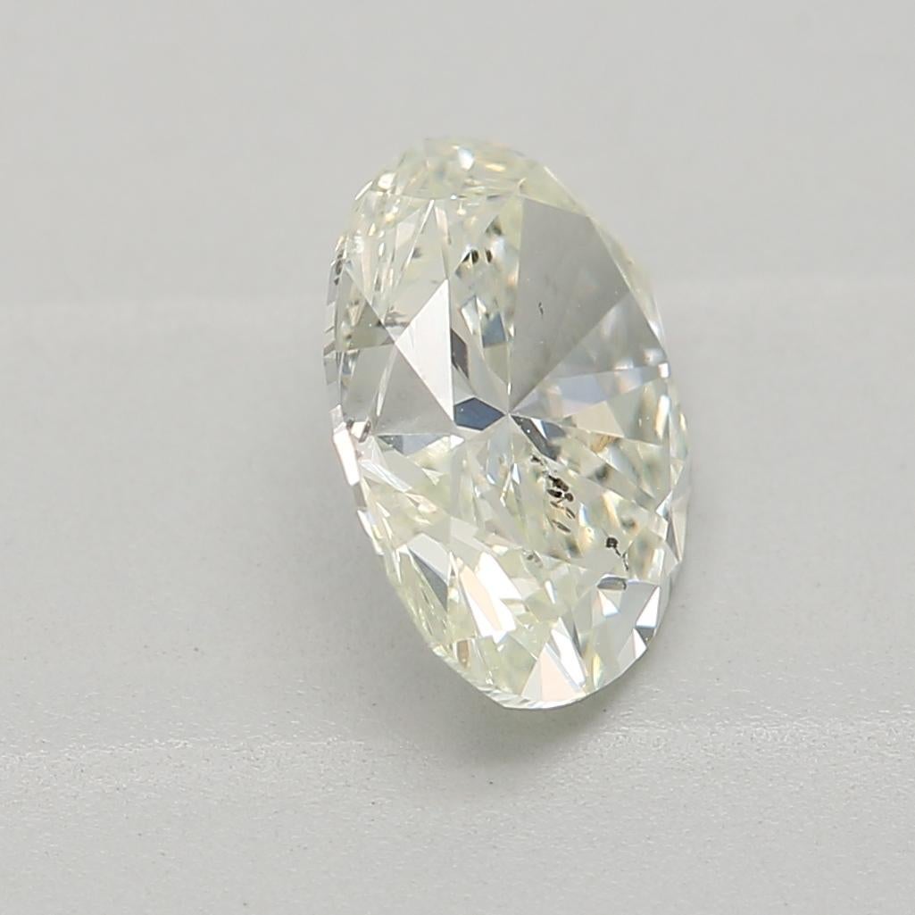 Women's or Men's GIA Certified 0.81 Carat Very Light Yellow Green SI2 Clarity Diamond For Sale