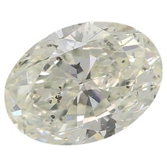 Diamante certificato GIA da 0,81 carati, di colore giallo molto chiaro e verde con purezza SI2