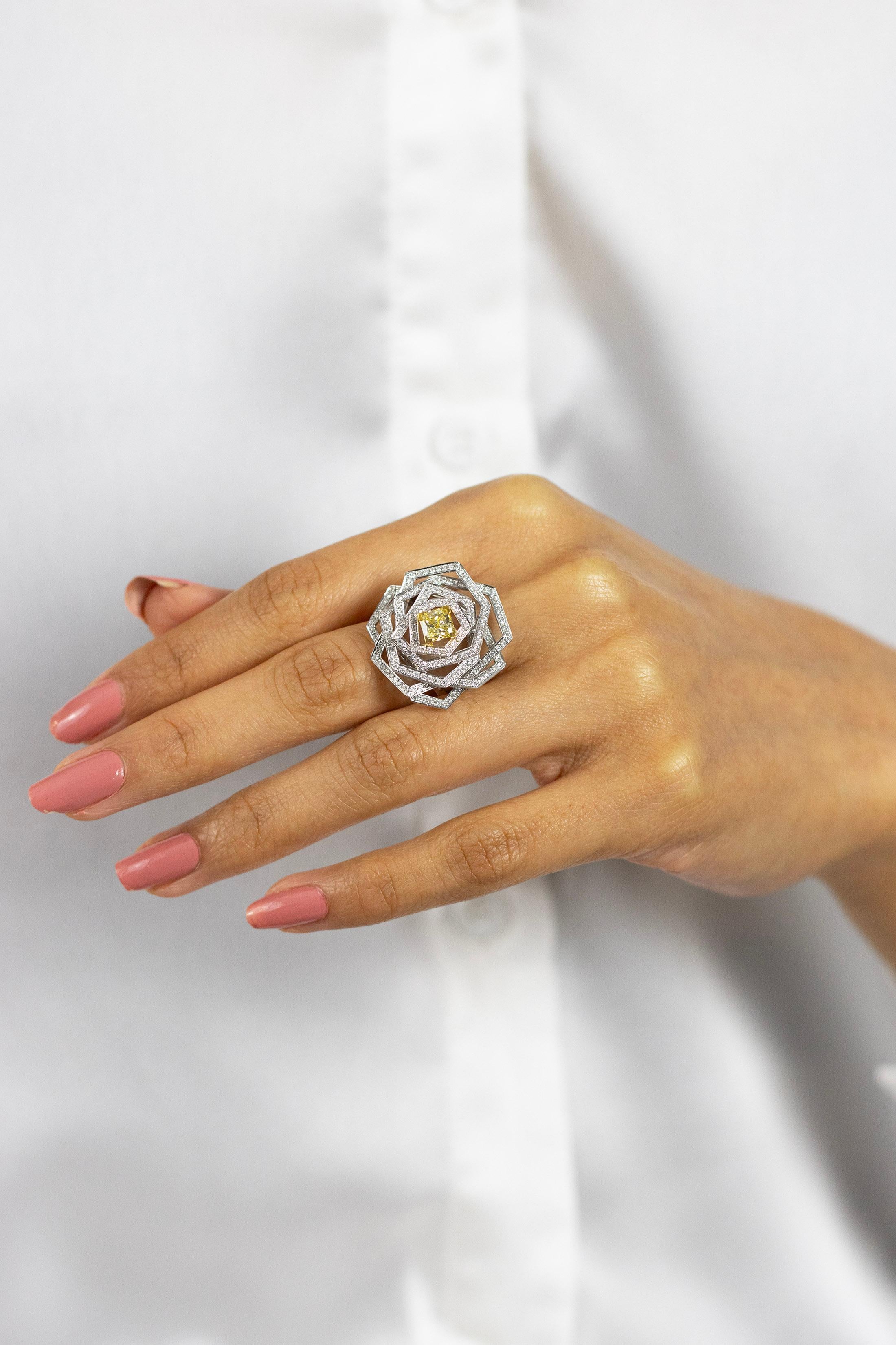 Women's GIA Certified 0.81 Carat Radiant Cut Fancy Intense Yellow Diamond Flower Ring For Sale