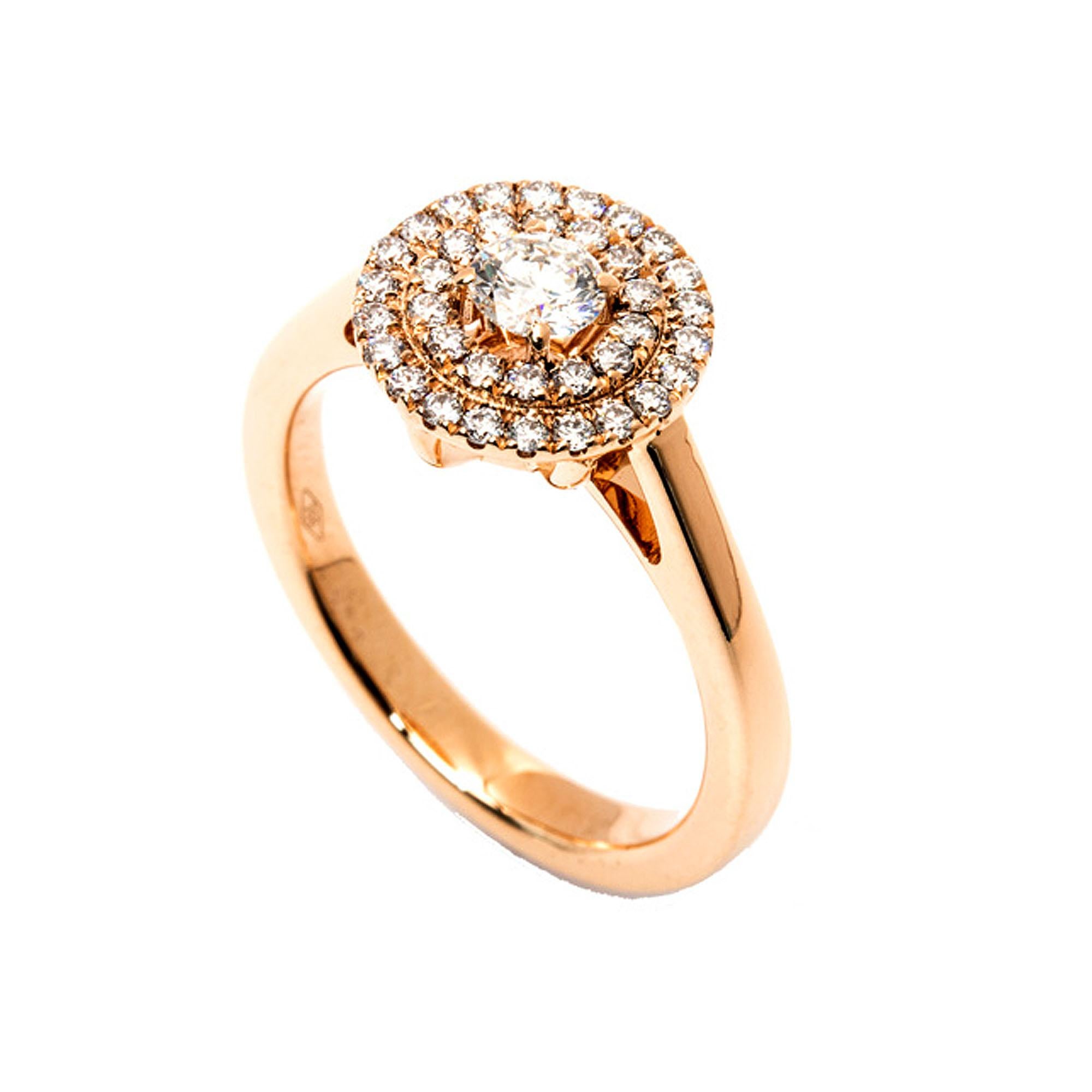 Presenting a breathtaking piece of jewelry, the GIA Certified Round Diamond Gold Double Halo Ring—a true testament to sophistication and timeless elegance. This exquisite ring features a centrally placed 0.50-carat diamond, certified by the