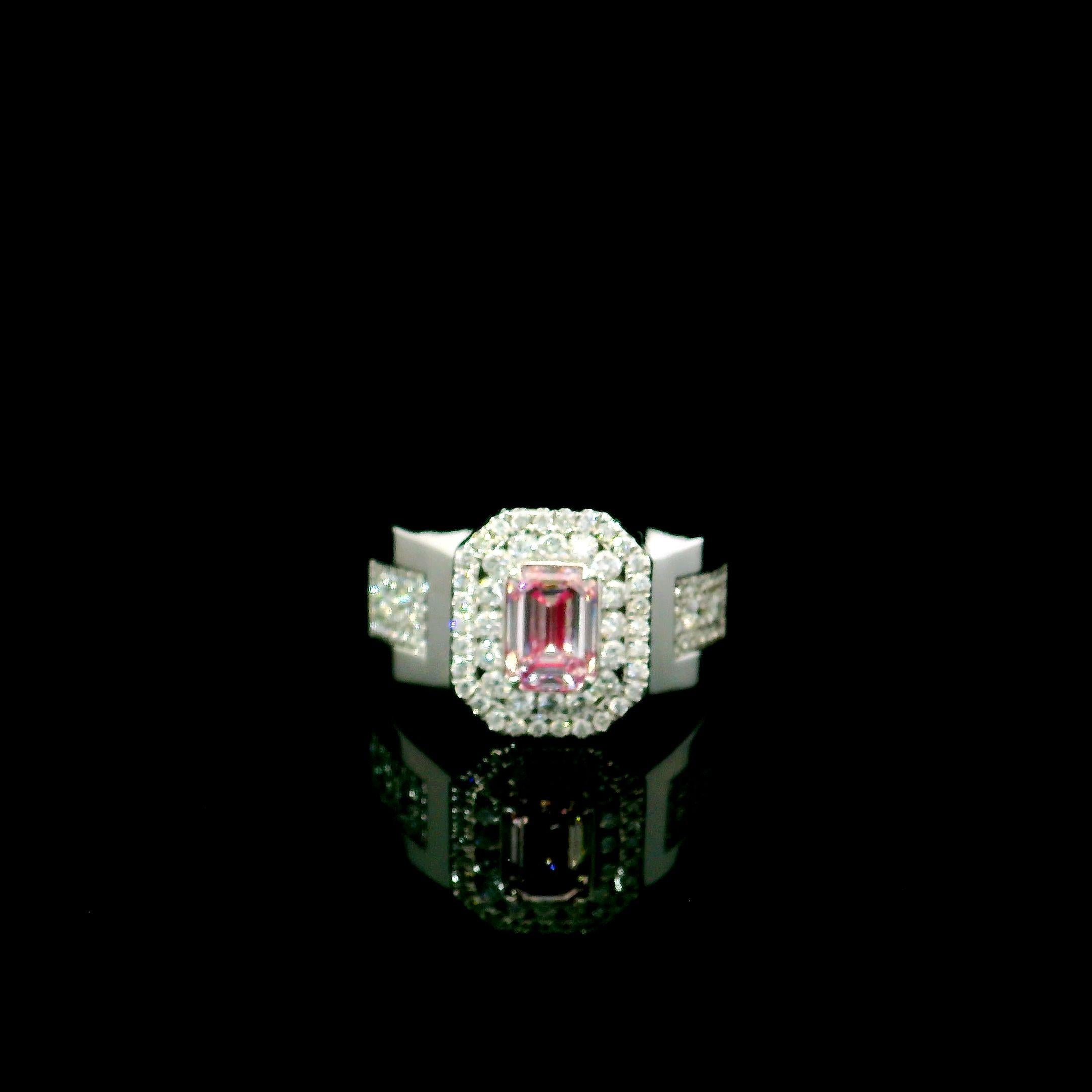 Emerald Cut GIA Certified 0.82 Carat Faint Pink SI1 Clarity Diamond Ring For Sale