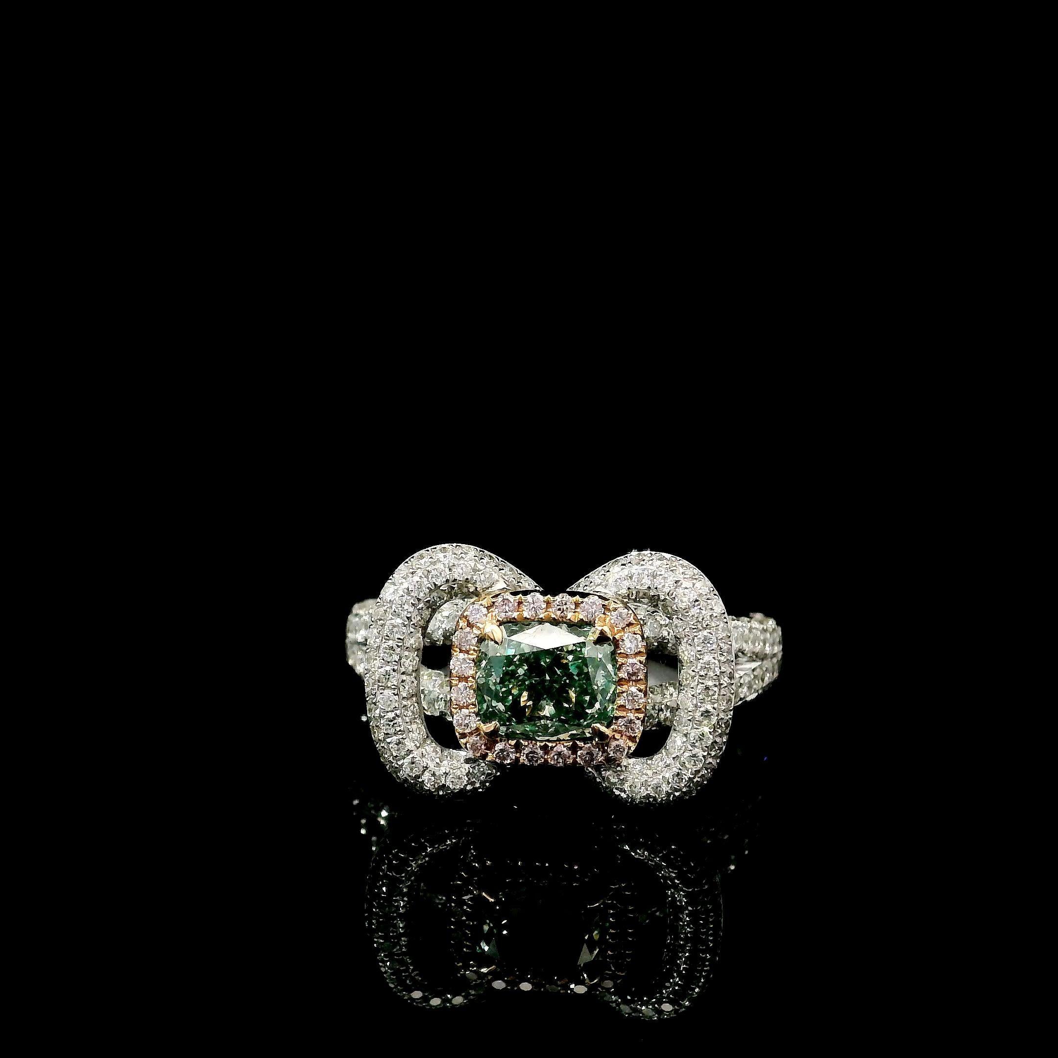 18kt white gold ring with diamonds
  
  Gold colour & karat: White gold 18kt
  Weight: 5.25 grams
  
  Set with-
  Stone type: Diamonds
  Shape: Cushion
  Carat: 0.82 ct
  Colour: Fancy Grayish Greenish Yellow
  Clarity: VS2
  
  Surrounding Stones: