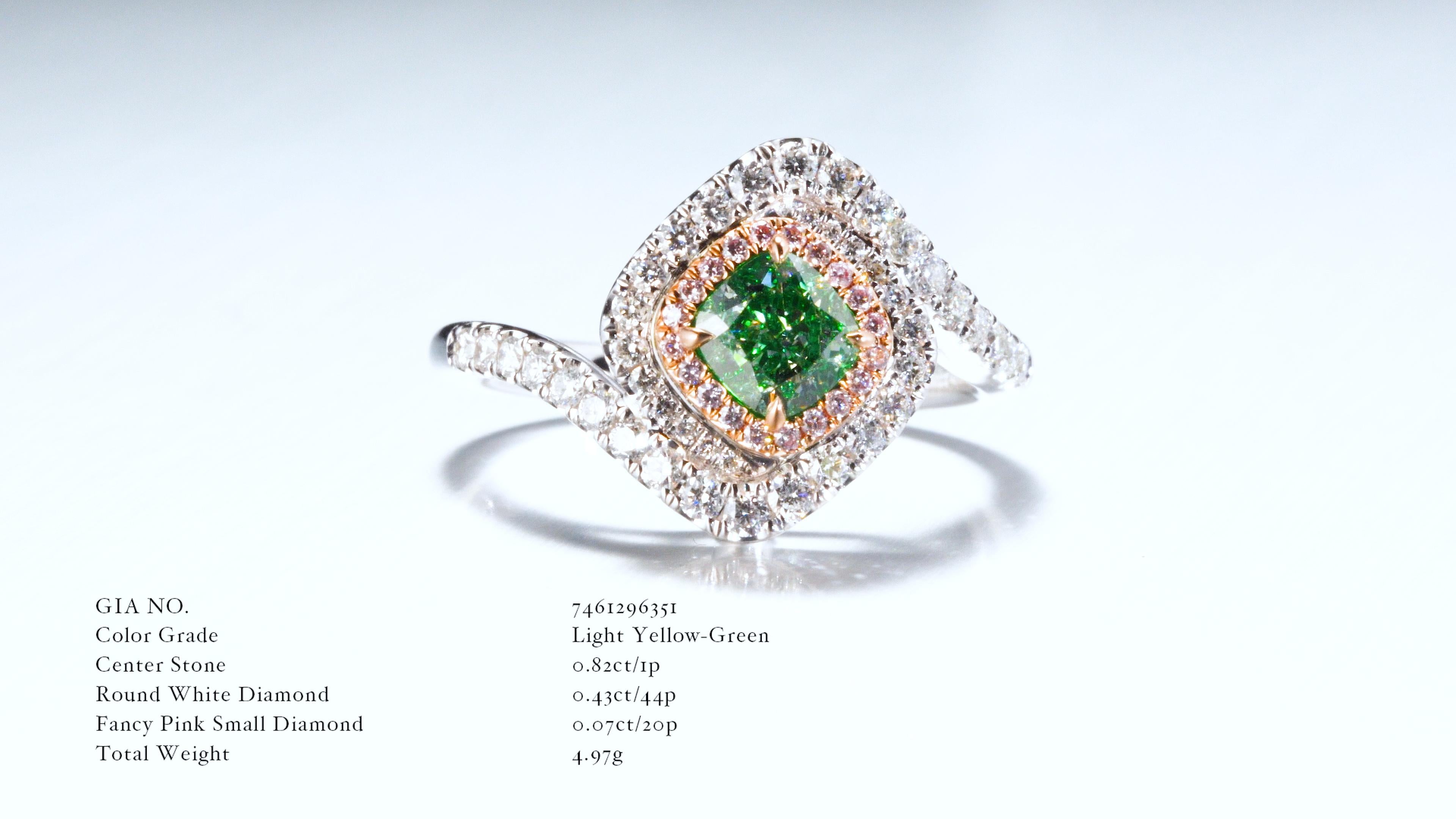 GIA Certified Natural Light Yellow-Green Diamond Ring is an extraordinary testament to the union of exceptional gemstones. At the heart of this stunning creation is a mesmerizing 0.82ct center diamond, certified by the Gemological Institute of
