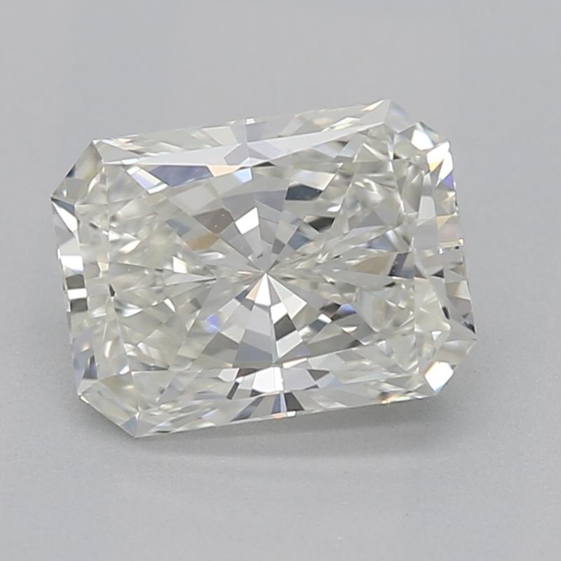 Handcrafted in New York, a stunning diamond ring featuring a captivating radiant J VS1 0.83 center stone radiates unparalleled elegance. The centerpiece is secured in a delicate four-prong basket setting, allowing light to dance through the diamond,