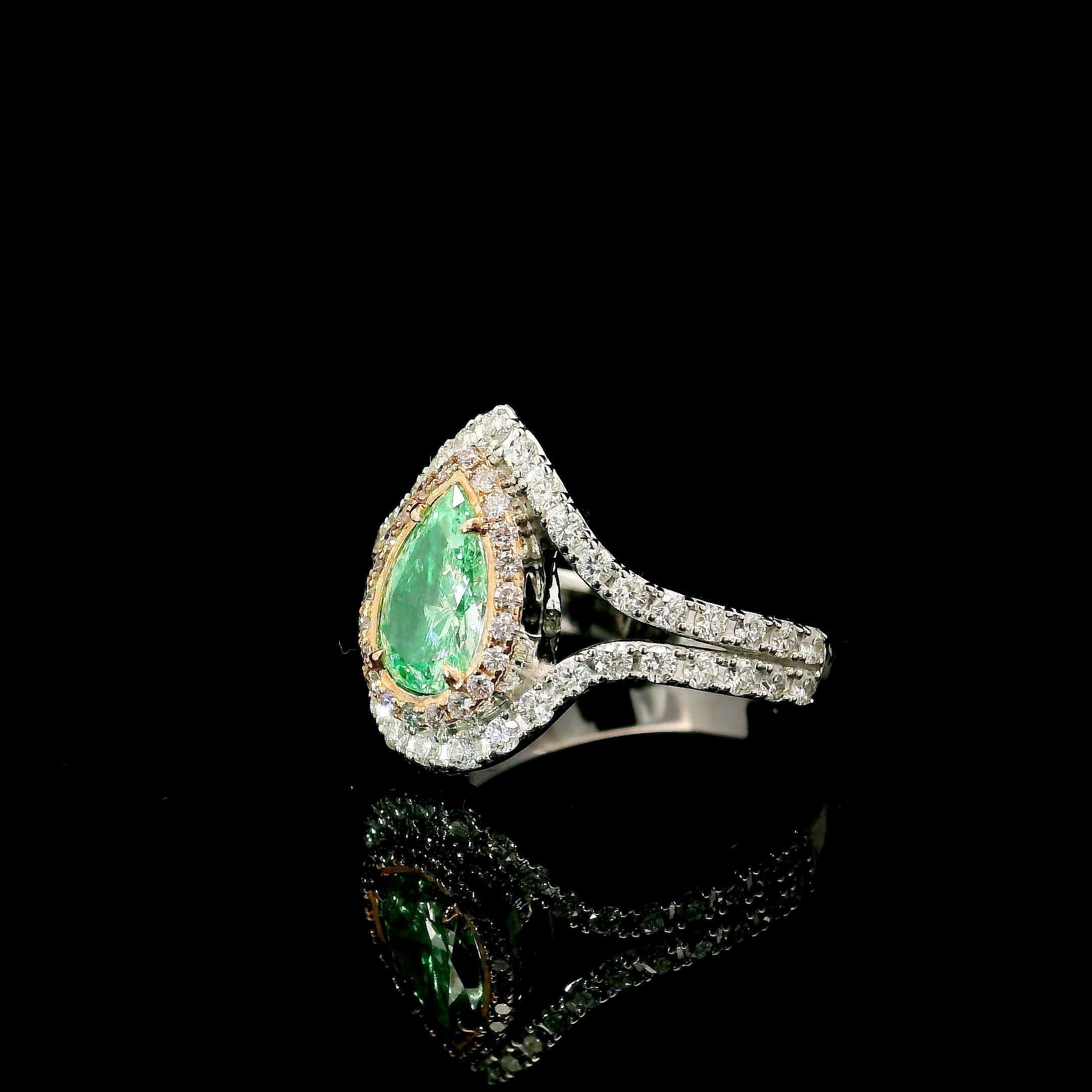 18kt white gold ring with diamonds
  
  Gold colour & karat: White gold 18kt
  Weight: 5.15 grams
  
  Set with-
  Stone type: Diamonds
  Shape: Pear
  Carat: 0.83
  Colour: Fancy Light Green  
  Clarity: VS2
  
  Surrounding Stones: Diamonds
 1)