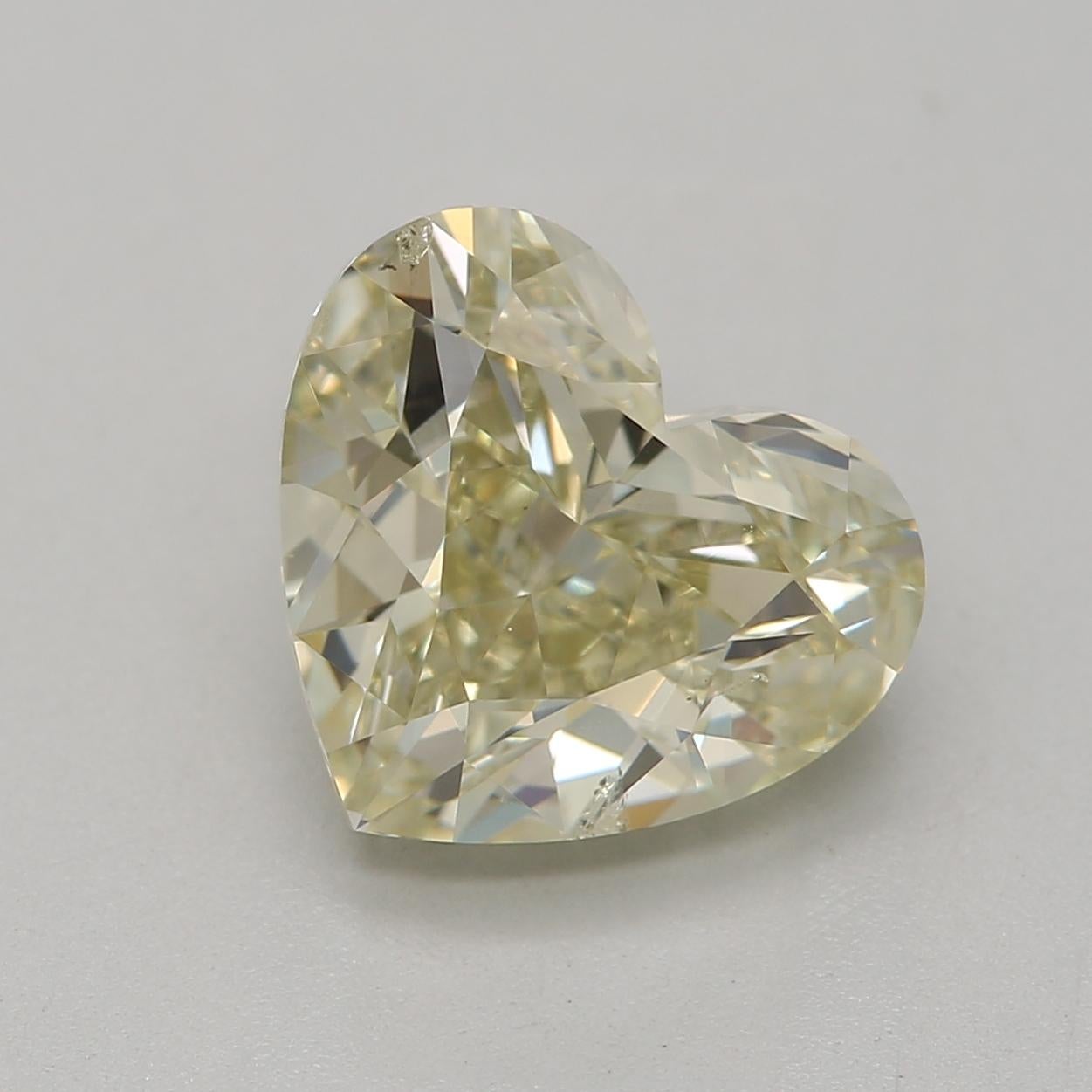 Certificate: GIA
Report Number: 7235116855
Shape And Cut: Heart
Carat Weight: 2.00carat
Measurements: 7.17 x 8.05 x 4.92 mm
Color Grade: Fancy Light Brownish Greyish Yellow

Our heart-shaped diamond is a unique and romantic variation of the