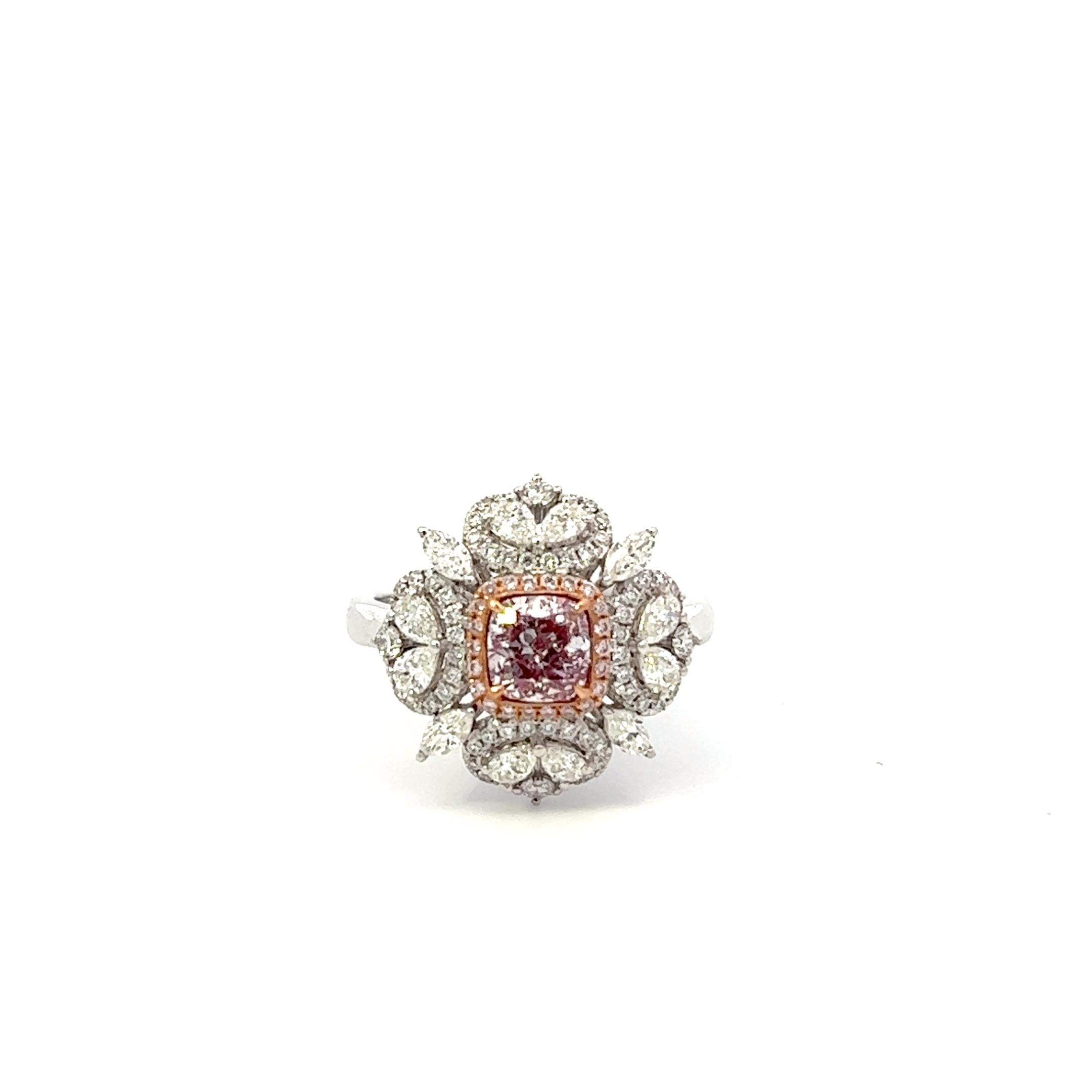Center: 0.84ct Light Pink Cushion I1 GIA# 2183657579
Setting: 18k White Gold 0.93ctw Pink and White Diamonds

An extremely rare and stunning natural pink diamond center. Pink Diamonds account for less than 0.01% of all diamonds mined in the world!