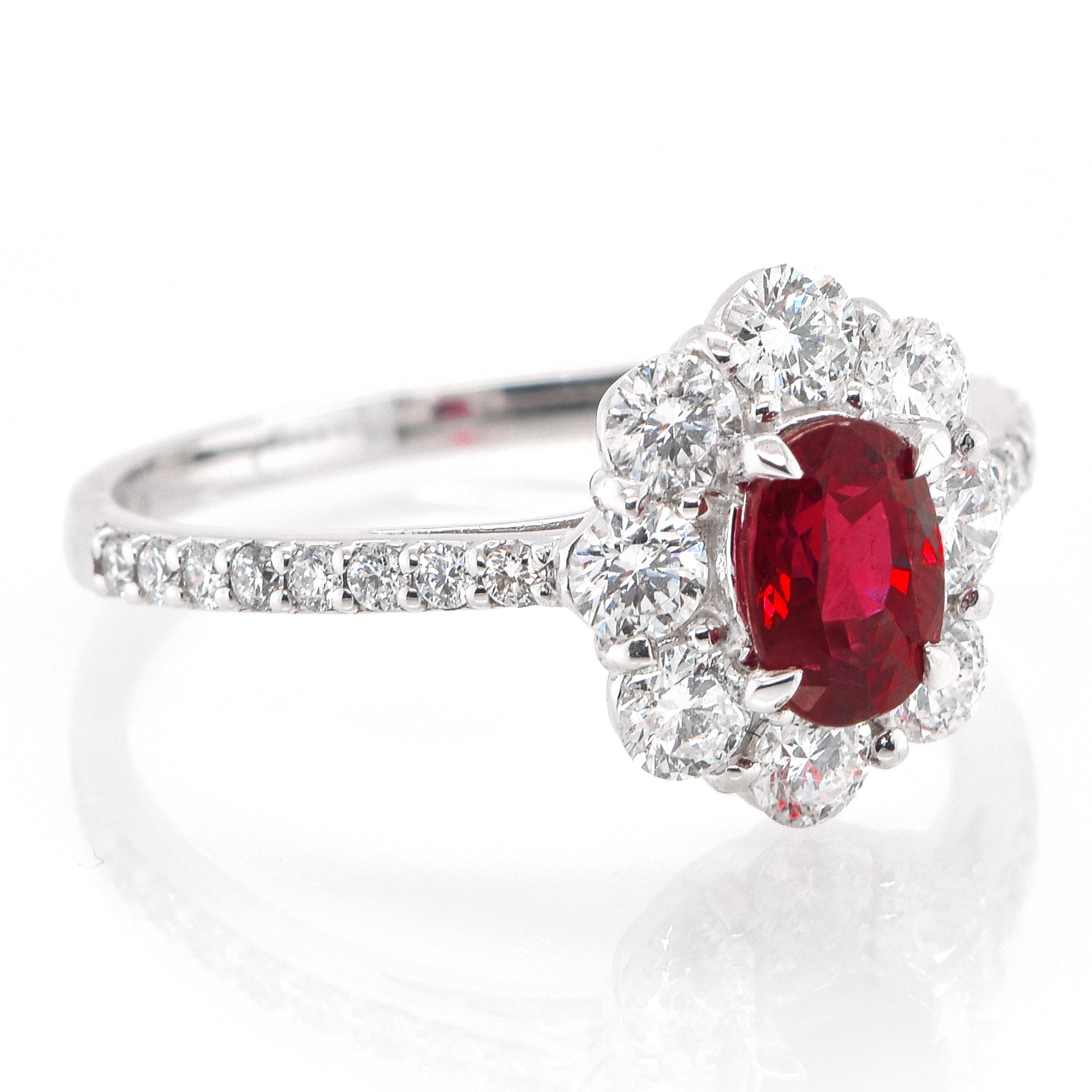 A beautiful ring set in Platinum featuring a GIA Certified 0.85 Carat Natural Thailand Ruby and 0.74 Carat Diamonds. Rubies are referred to as 