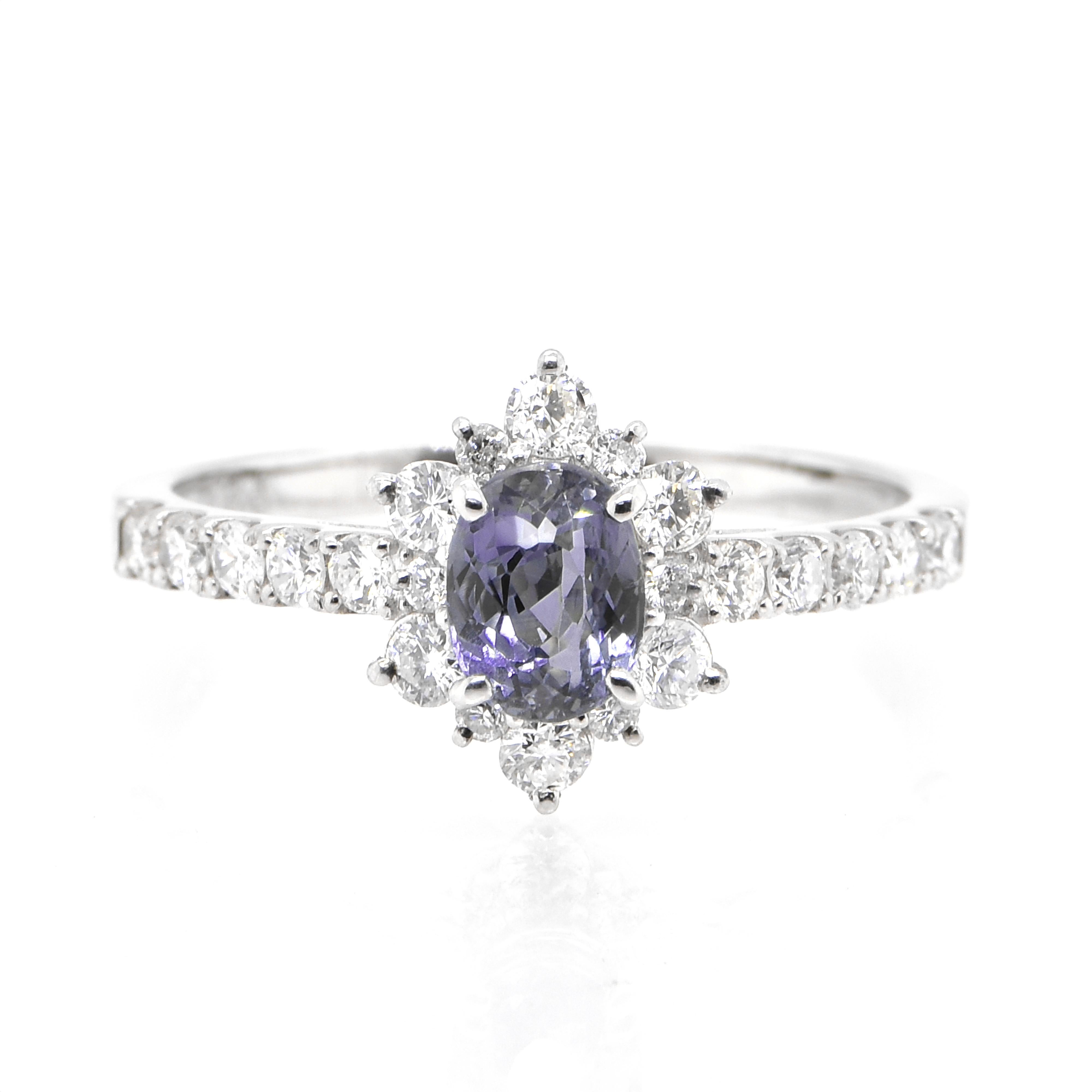 A gorgeous ring featuring GIA Certified 0.86 Carat, Nature Brazilian Alexandrite and 0.50 Carats of Diamond Accents set in Platinum. Alexandrites produce a natural color-change phenomenon as they exhibit a Bluish Green Color under Fluorescent Light