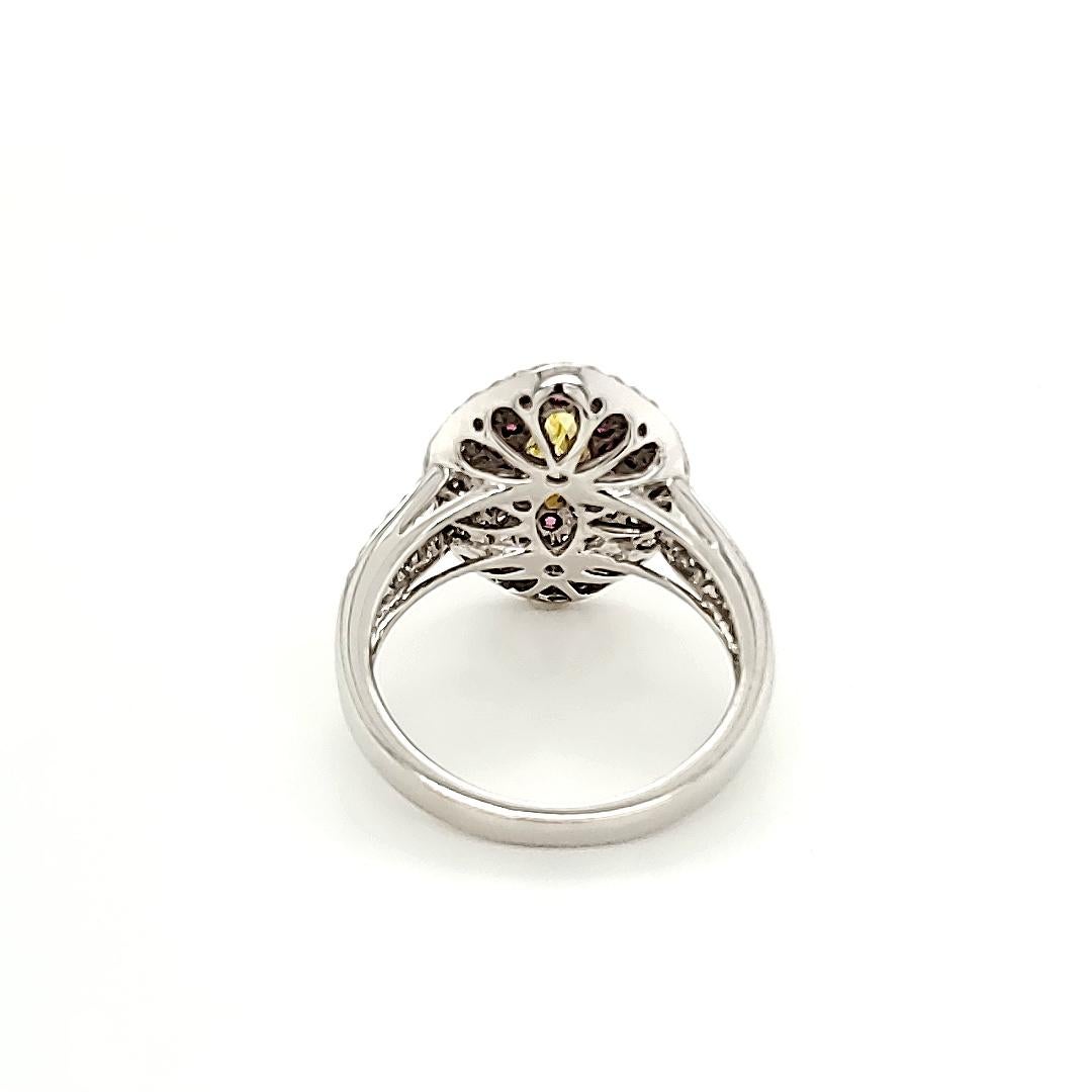 Modern GIA Certified 0.87 Carat Fancy Intense Yellow Marquise Diamond Ring