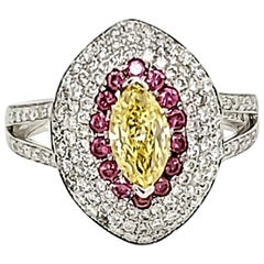 GIA Certified 0.87 Carat Fancy Intense Yellow Marquise Diamond Ring