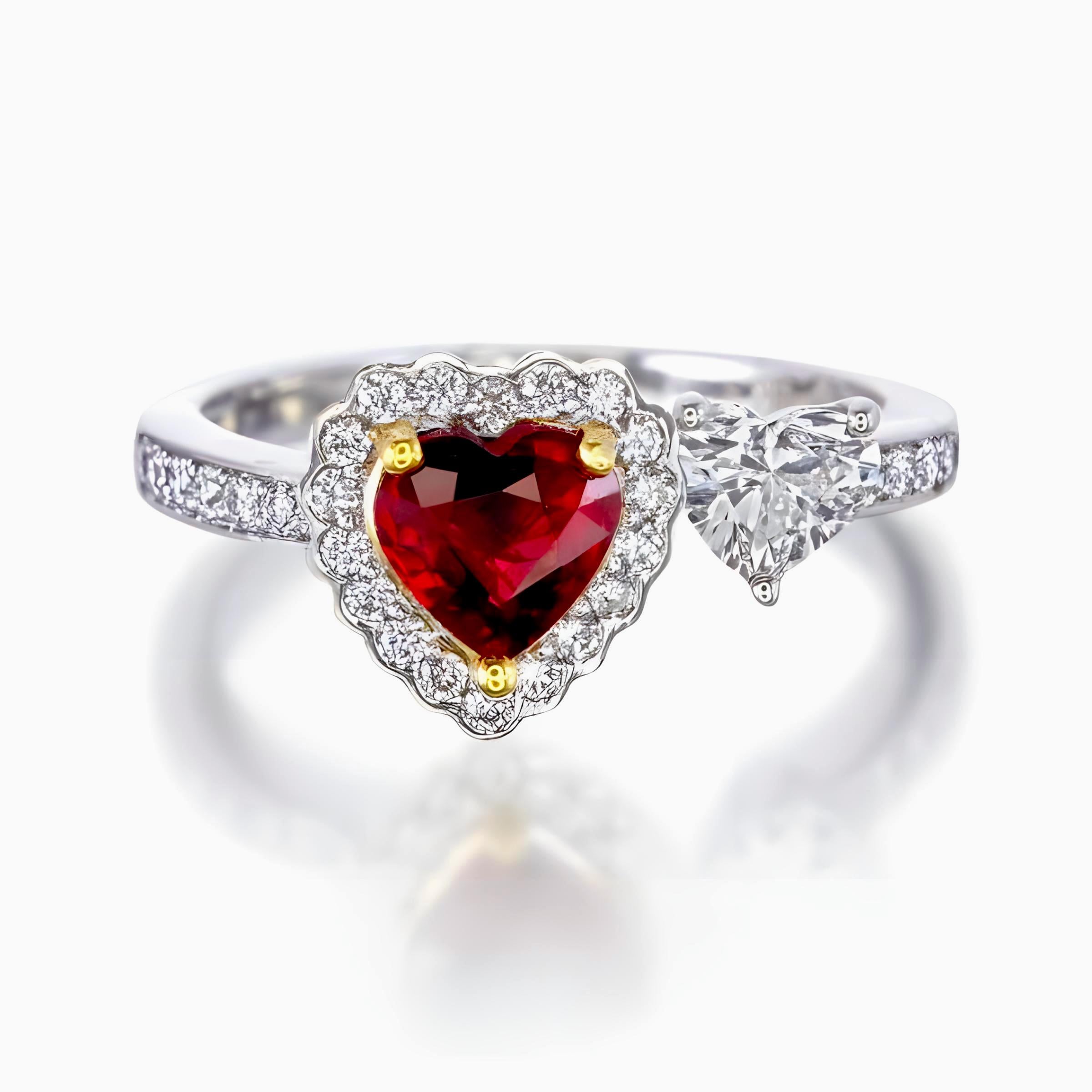 This ring features a 0.88-carat GIA-certified heart-cut red ruby from Burma, left unheated to showcase its natural, intense red color (certificate number GIA3505474904). Paired with a 0.42-carat heart-cut diamond, this combination brings a romantic