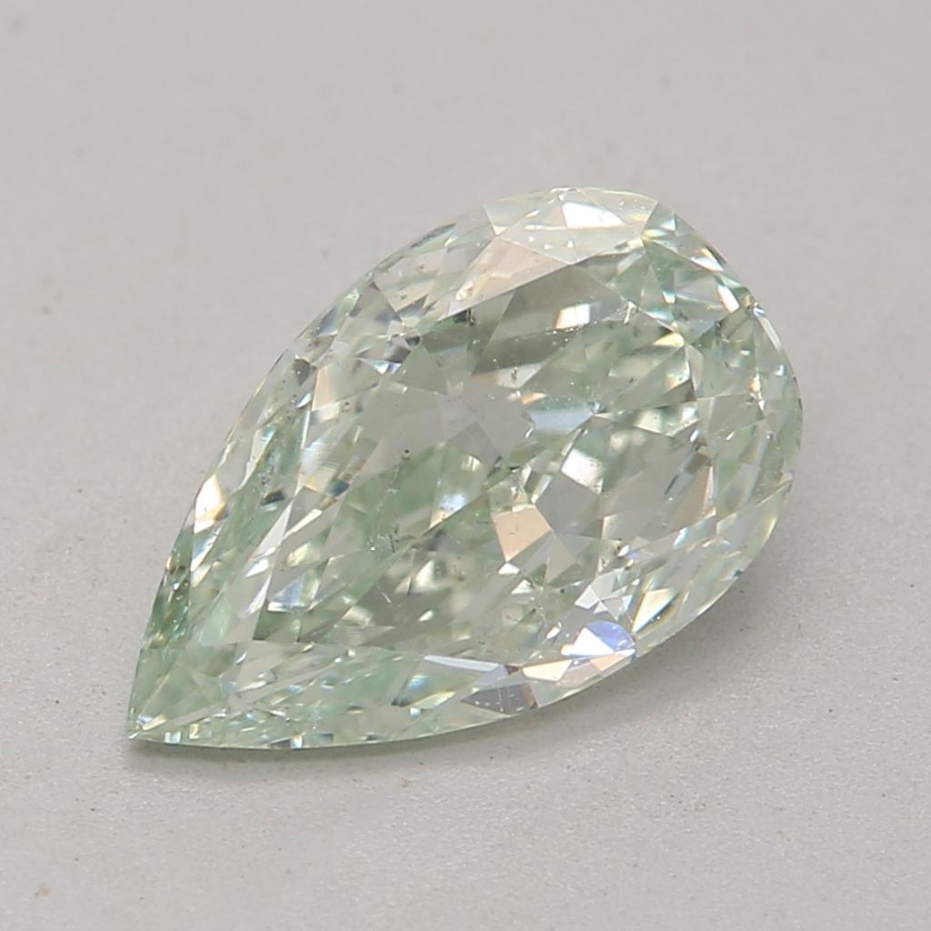 Certificate: GIA 
Report Number: 6375586877
Shape And Cut: Pear
Carat Weight: 0.88 carat
Measurements: 8.6 x 5.31 x 2.83 mm
Color Grade: Fancy Bluish Green

FEATURES OF THE DIAMOND:

This fancy bluish green diamond is a rare and striking diamond