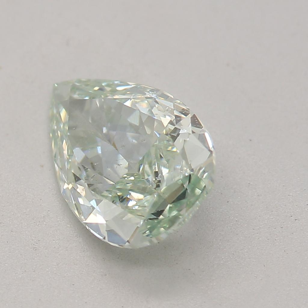 Pear Cut GIA Certified 0.88 Carat Fancy Bluish Green SI2 Clarity Diamond For Sale