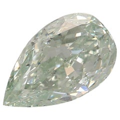 Diamante certificado por el GIA de 0,88 quilates de color verde azulado fantasía y claridad SI2