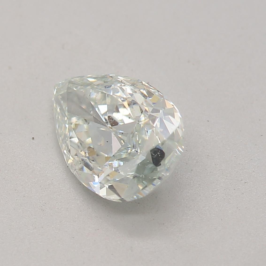 Pear Cut GIA Certified 0.88 Carat Light Green SI1 Clarity Diamond For Sale