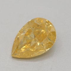 GIA Certified 0.89 Carat Fancy Intense Orangy Yellow I1 Clarity Diamond