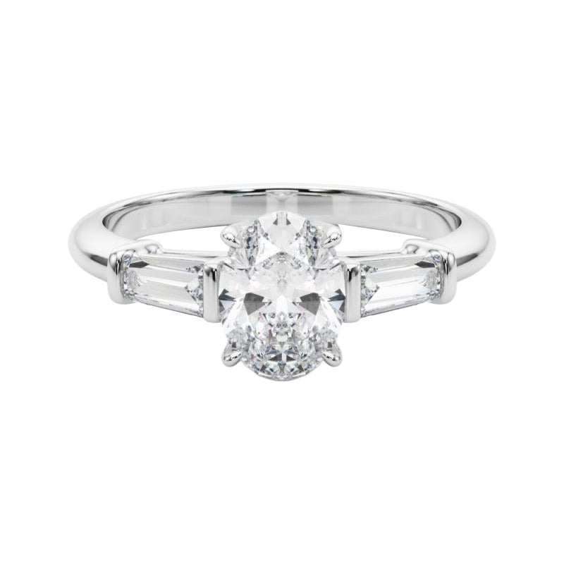 Bague à trois pierres en diamant ovale et baguette de 0,9 carat certifiée par le GIA