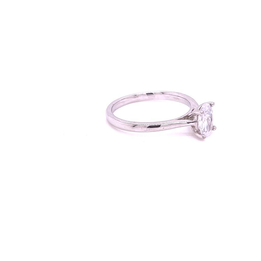 For Sale:  GIA Certified 0.9 Carat Oval Diamond Solitaire Ring in Platinum 6