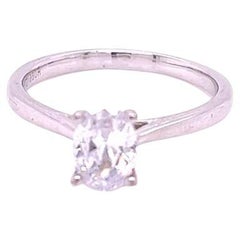 Bague solitaire en platine avec diamant ovale de 0,9 carat certifié GIA