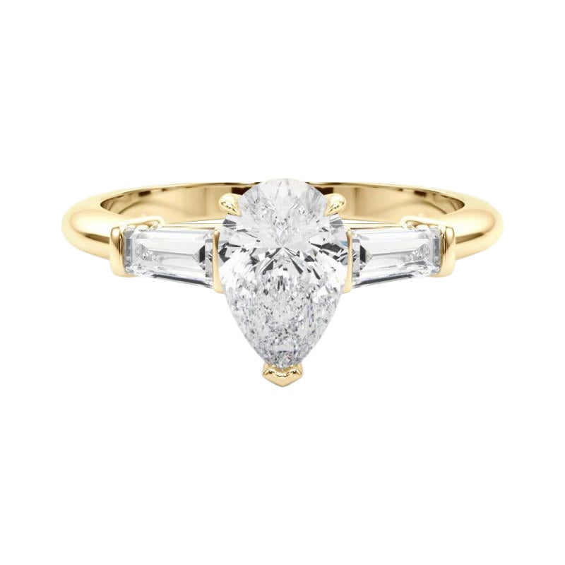 GIA Certified 0.9 Carat Pear & Baguette Three-Stone Diamond Ring (bague à trois pierres)
