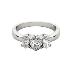 GIA Certified 0.9 Carat Three-Stone Oval 18K White Gold Diamond Ring