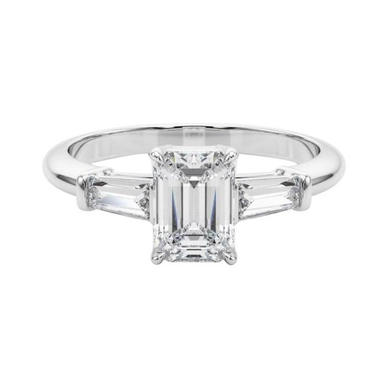 GIA Certified 0.90 Carat Emerald
Baguette Three-Stone Platinum Diamond Ring