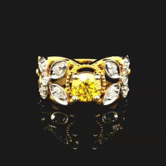 GIA Certified 0.90 Carat Fancy Vivid Yellow I1 Clarity Diamond Ring