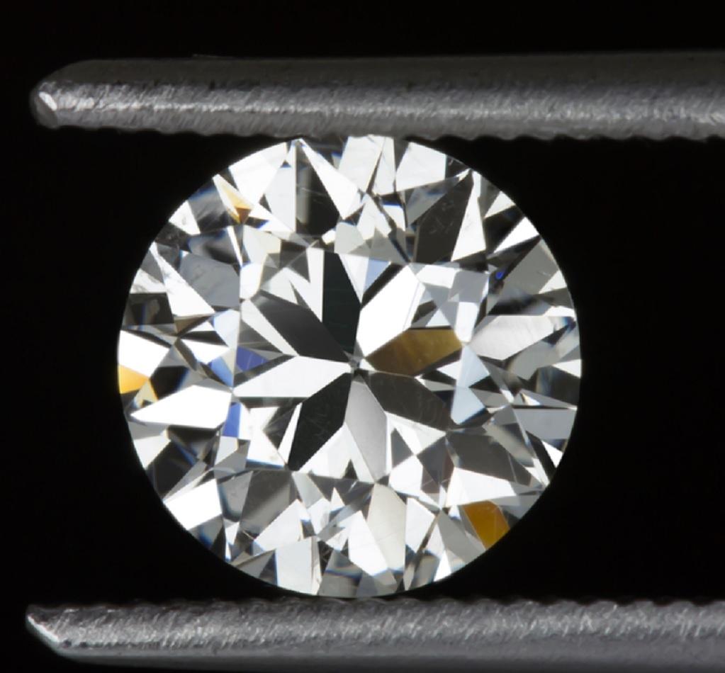 Stunning antique Old European cut certified diamond has absolutely vivid fire and dazzlingly bright sparkle. Cut by hand a lifetime ago, this completely eye clean and beautifully white 1.18ct diamond is completely unique, guaranteed to be 100%