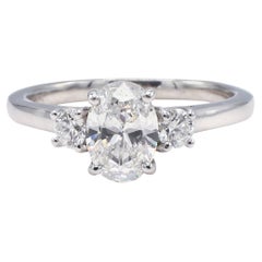 GIA Certified 0.90 Carat Oval D VVS2 3 Stone 18K White Gold Engagement Ring