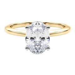 Anello con diamante solitario ovale incastonato, certificato GIA, da 0,90 carati