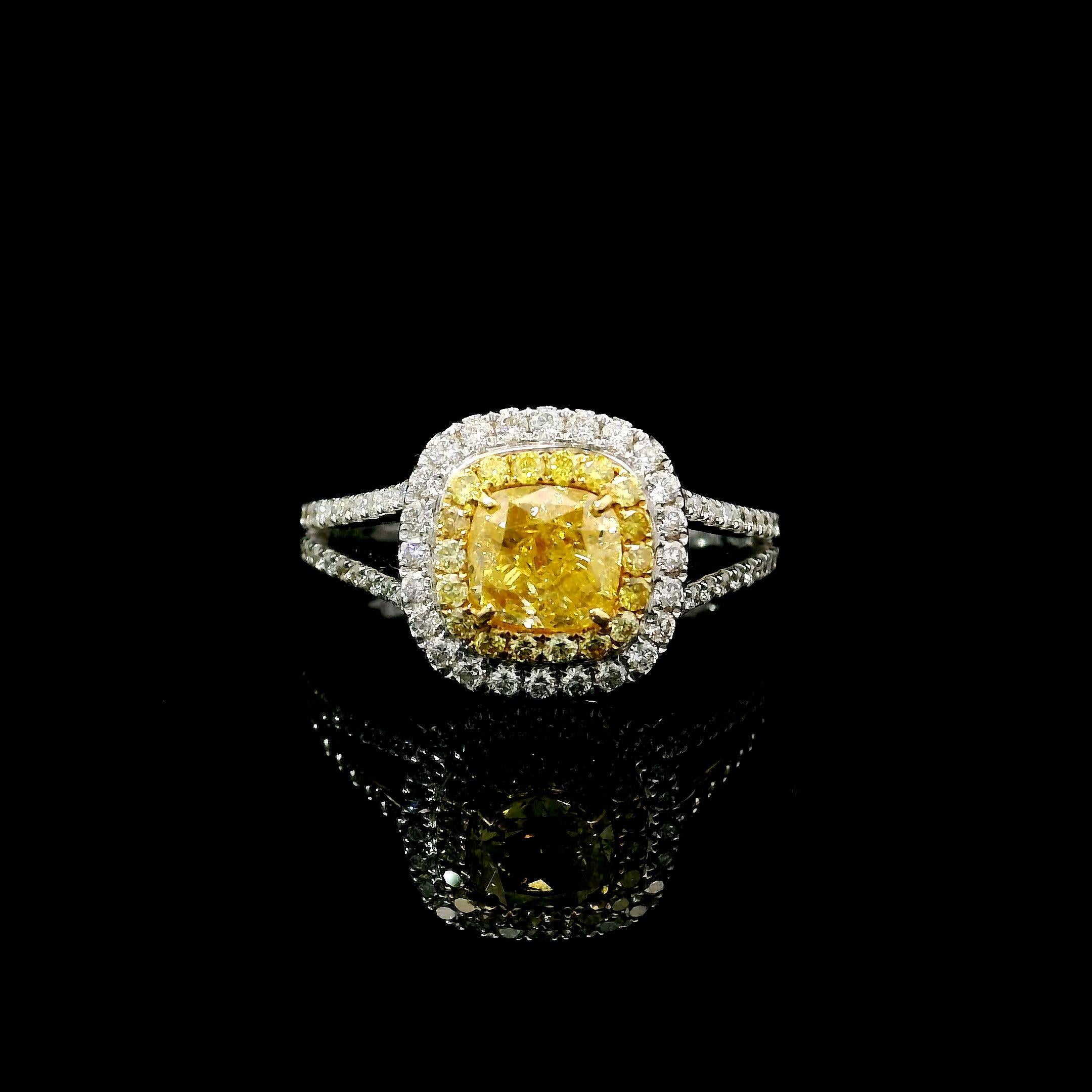 18kt white gold ring with diamonds
  
  Gold colour & karat: White gold 18kt
  Weight: 3.80 grams
  
  Set with-
  Stone type: Diamonds
  Shape: Cushion
  Carat: 0.91
  Colour: Fancy Yellow
  Clarity: I2
  
  Surrounding Stones: Diamonds
 1) White