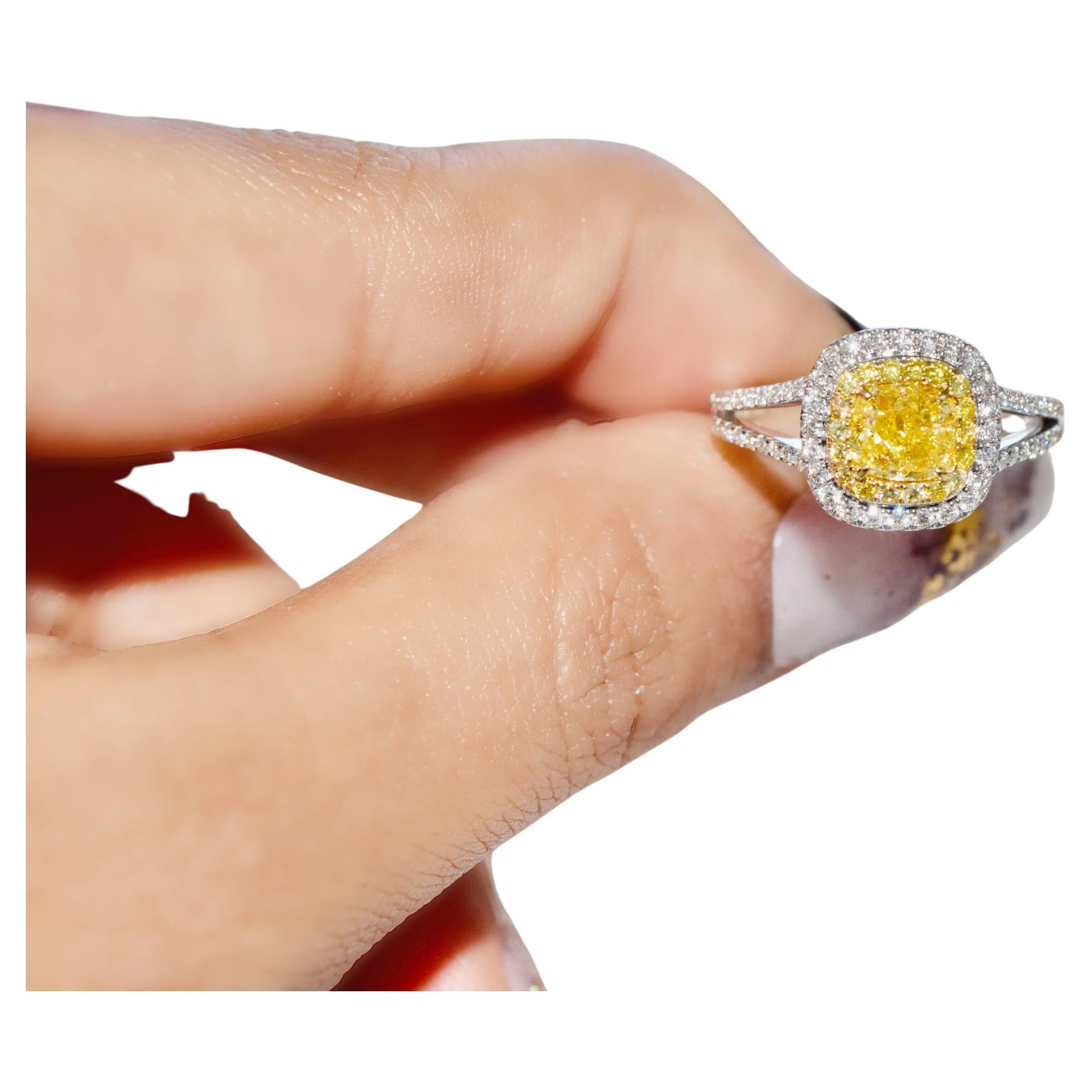 GIA Certified 0.91 Carat Fancy Yellow I2 Clarity Diamond Ring For Sale