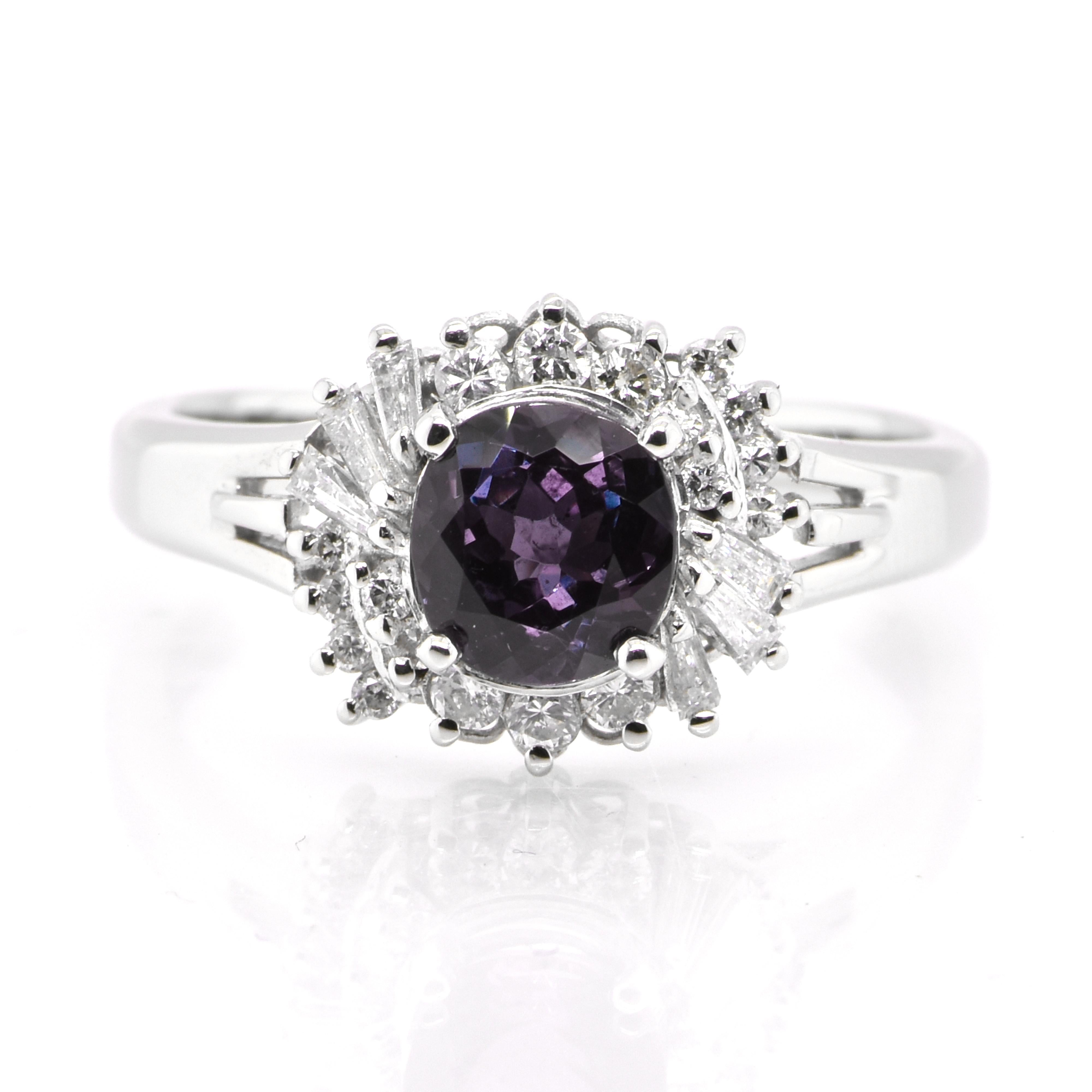 A gorgeous ring featuring a GIA Certified 0.92 Carat, Natural Brazilian Alexandrite and 0.31 Carats of Diamond Accents set in Platinum. Alexandrites produce a natural color-change phenomenon as they exhibit a Bluish Green Color under Fluorescent