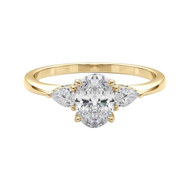 Anillo de diamantes de oro amarillo de 18 quilates con certificado GIA de 0,93 quilates en forma de óvalo y pera de tres piedras