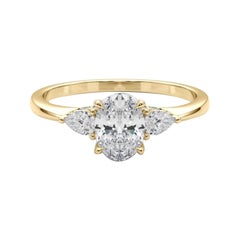 GIA Certified 0.93 Carat Oval & Pear Three-Stone 18K Yellow Gold Diamond Ring