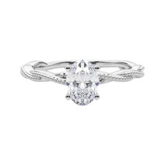 Anillo de diamantes en platino con banda trenzada ovalada de 0.93 quilates con certificado GIA