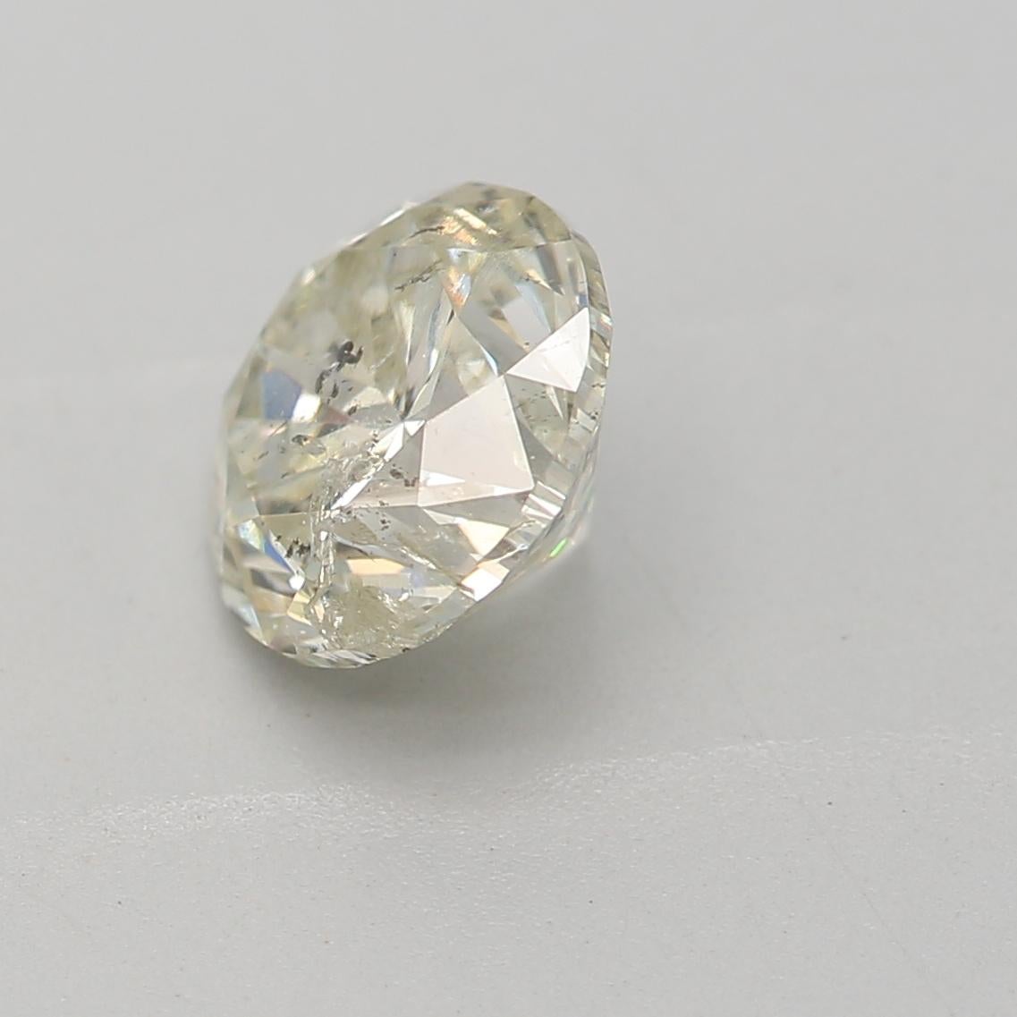 Round Cut GIA Certified 0.94 Carat M Colour I2 Clarity Diamond For Sale